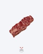 Short ribs korean style thin-cut across the bone on butcher paper at Boucherie Beirut Laval