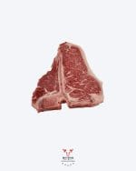 T-bone steak with signature bone on butcher paper at Boucherie Beirut Laval