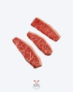 Wagyu 9+ striploin steak fullblood with extreme marbling on butcher paper at Boucherie Beirut Laval