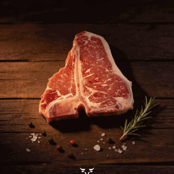 T-bone steak with signature bone on butcher paper at Boucherie Beirut Laval