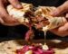 Beef shawarma wrap pulled apart revealing spiced grilled beef garlic sauce and pickled onions – Boucherie Beirut Laval