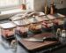 Five glass meal prep containers labelled Monday to Friday filled with halal beef portions on a marble kitchen counter – Boucherie Beirut Laval